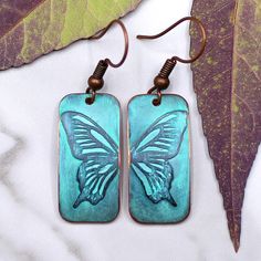 "Butterfly Wings, Handmade Copper Earrings - A graceful fusion of nature's beauty and symbolic elegance. Adorned with butterfly wings, these earrings embody the transformative symbolism of the butterfly, representing metamorphosis, growth, and the beauty of change. Perfect for free spirits, nature enthusiasts, and those embracing personal growth. These earrings resonate with individuals who cherish the symbolism of the butterfly. Representing resilience and the beauty of evolution, the butterfly Unique Nickel-free Butterfly Earrings, Nature-inspired Butterfly Earrings For Gift, Handmade Copper, The Butterfly, Copper Earrings, Turquoise Color, Butterfly Wings, Free Spirit, Fused Glass