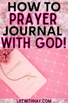 a pink book with the words how to prayer journal with god on it and flowers