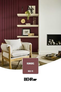 a living room filled with furniture and a fire place in front of a red wall