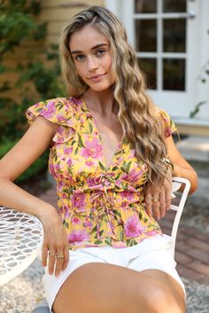 Ruffle blouses are a stylish and feminine addition to any wardrobe. With delicate ruffles and a range of designs, from classic to trendy, these blouses offer a versatile option for both casual and formal occasions. Whether you prefer a flowy and bohemian look or a more structured and sophisticated style, there's a ruffle blouse to fit your unique taste. Shop now to find your perfect ruffle blouse and add a touch of elegance to any outfit. Ruffled Blouse Outfit, Ruffled Blouse, Ruched Top, Bohemian Look, Ruffled Sleeves, Low Iron, Ruffle Sleeves, Flutter Sleeves, Stay Cool