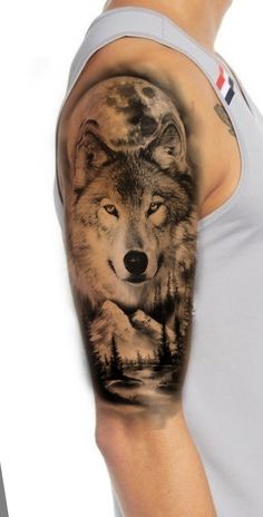 a man with a wolf tattoo on his arm