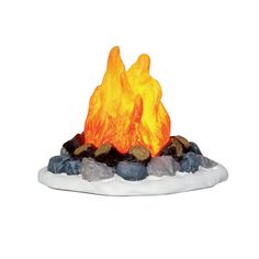 a small fire is lit on top of some rocks and pebbles in front of a white background