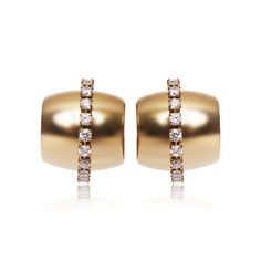 Our beautiful Serena Earrings feature a cuff hoop silhouette with a brightly polished finish, studded with sparkling round brilliant cut stones in the middle for total glamor. These little hoops sit close to the earlobes, making them the perfect finishing touch to your look, day or night. Metal Type: Stainless Steel Metal Plating: 18K Gold PlatedStone: Cubic ZirconLength: 0.78" Elegant Hoop Clip-on Earrings For Formal Occasions, Elegant Hoop Clip-on Earrings For Formal Events, Elegant Formal Clip-on Hoop Earrings, Gold Diamond Hoop Earrings For Evening, Modern Diamond Small Hoop Earrings, Elegant Small Hoop Clip-on Earrings, Modern Gold Earrings With Sparkling Stones, Elegant Hoop Clip-on Earrings, Elegant Diamond White Huggie Earrings For Formal Events