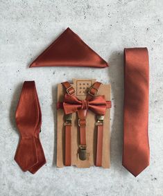 Description Size Chart Shipping Return & Exchange About This bundle includes one 1/2” Cognac adjustable faux leather suspender along with one bronze/rust orange silk bow tie. (Long Neck Tie set bundle only available for adult sizes). **Suspenders are also available in 1” width for a slightly different look.** Trust the designers at London Jae Apparel to have you looking dashing at your next event. No matter the occasion, our designs will have you standing above the rest. Groom, groomsmen gift, w Brown Groomsmen, Orange Bow Tie, Rustic Wedding Groomsmen, Groomsmen Suspenders, Burnt Orange Weddings, Bearer Outfit, Ring Bearer Outfit, Boda Mexicana, Leather Suspenders