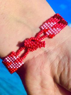 Red Zig Zag Pattern Seed Bead Bracelet delicately handmade by an indigenous Mayan family of women in Guatemala. Makes for a great gift as a stocking stuffer or friendship bracelet! Also festive for a little holiday flair. Other ideas: birthday gift, Christmas gift, holiday gift, and/or a his/hers, his/his, hers/hers couples bracelet! *Please note that all of our items are handcrafted and unique to each piece. Also, colors may vary slightly based on your device. Like what you see here? Check out Mayan Women, Ideas Birthday Gift, Small Dream Catcher, Beach Bracelet, Bohemian Style Jewelry, Couples Bracelet, Beach Bracelets, Seed Bead Bracelet, Red Bracelets