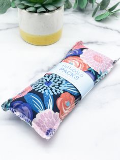 "This listing is for a 1 hot/cold therapy rice pack. They are great for sore and tender areas, as well as neck, back, arm, leg, you name it! You can also use them to heat your hands in the winter in pockets, use as a mini heater for a child's bed, an accident buddy for your child's injuries, cold pack for headaches, or to soothe ache arthritic areas. It is approximately 9\"-4.5\" big. It comes in the print shown in the picture and are 100% cotton. These are ready for ship! Print placement may vary. Packs are filled with half Organic Flax seed and rice to help hold heat. They are packaged in an recycled paper wrapper. I did not put any essential oils, or herbs in them, so they can be used for sensitive areas and not cause any possible reactions or allergies.  To use:  *Hot: Heat in a microw Rice Bed, Bed Warmer, Rice Pack, Lavender Eye Pillows, Hot Cold Packs, Hot Pack, Nursing Pads, Relaxation Gifts, Cold Pack