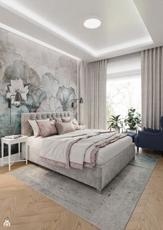 an image of a bedroom setting with flowers on the wall and bed in the foreground