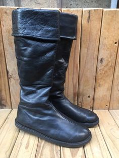 Elevate your style with these Trippen women's black Leather Knee High boots! 👢✨ Perfect for any season, occasion, or outfit. Step out in comfort and fashion with these stylish boots. #Trippen #LeatherBoots #Fashionista #StylishLook #ShoeLove  #eBay #eBayStore #RoundToe #Black #Boot #eBaySeller #Leather #KneeHigh #Trippen #Women #USA #Winter #PullOn #Germany #Spring #Fall #Boots #Standard #FlatUnder1in #Flat Black Wide Calf Wedge Boots For Winter, Winter Black Wide Calf Wedge Boots, Winter Heeled Boots With Leather Sole, Leather Heeled Boots With Round Toe For Winter, Wide Calf Boots With Round Toe For Winter, Winter Heeled Boots With Leather Sole And Round Toe, Leather High-top Heeled Boots For Winter, Winter Leather Heeled Boots With Round Toe, Winter High-top Leather Heeled Boots