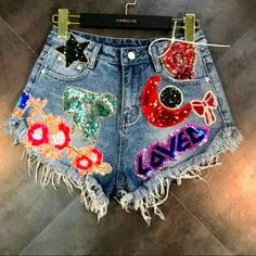 Make A Statement In These Super Cute Denim Shorts! Featuring A Mid-Blue Wash Denim With Distressed Detailing, And Fun Sequin Patchwork. Medium: Waist= 26.38in Hips=35.43in Length=13in Large: Waist= 27.56in Hips=36.61in Length=13in Xlarge: Waist=28.74in Hips=37.79in Length=13in Shorts Female, Sequins Embroidery, Raw Denim, Moon Stars, Female Fashion, Baby Blue, New Arrivals, Denim Shorts, Moon