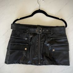 Never Worn. Live Out Your Y2k Dream In This Iconic Faux Leather Cargo Skirt. With Its Cool Cargo-Style Pockets, And Faux Leather Fabric, It's The Go-2 Skirt In Every It Girl's Closet. * Mini Skirt * Imported * Belt Detail * Utility Style Pockets Vintage Mini Skirts, 60s Fashion Vintage, Cargo Mini Skirt, Mini Skirt Black, Utility Style, Girl Closet, Cargo Style, Cargo Skirt, Faux Leather Fabric