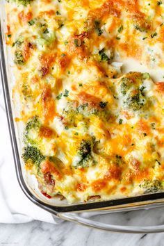 a casserole dish with broccoli and cheese