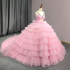 Tiered Pink Tulle Ball Gown - V-Neck Pleated Evening Dress with Crystal Beadings Pink Tulle Ball Gown For Evening, Tiered Tulle Gown For Debutante Ball, Tiered Gown For Wedding And Prom Season, Tiered Evening Dress For Wedding And Prom Season, Tiered Evening Dress For Wedding In Prom Season, Tiered Tulle Ball Gown For Weddings, Tiered Tulle Gown For Wedding, Tulle Balls, Tulle Ball Gown