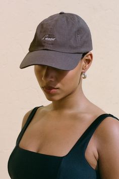 In a vintage-inspired Cocoa brown cotton, the L'Oasis Souvenir Cap offers a classic cap shape and features an adjustable back strap for ease of fit. An understated L'Oasis logo is delicately embroidered at the front, and Faithfull at the back. Designed to be a sunshine essential, the Souvenir Cap is an effortless addition to any off-duty or vacation look. Vintage Everyday Baseball Cap With Curved Bill, Vintage Curved Visor Summer Hat, Vintage Baseball Cap With Curved Visor, Brown Cotton Baseball Cap With Curved Brim, Vintage Curved Bill Hat For Everyday, Brown Curved Bill Dad Hat For Everyday, Brown Dad Hat With Curved Bill For Everyday, Brown Dad Hat With Curved Bill, Everyday Brown Cotton Dad Hat