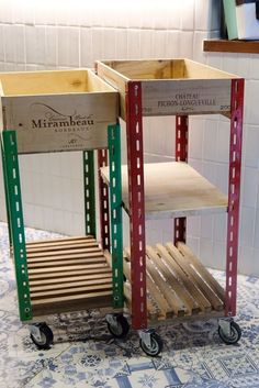 two wooden crates sitting on top of a tiled floor