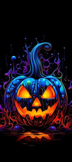 a halloween pumpkin with glowing eyes on it's face and flames coming out of its mouth