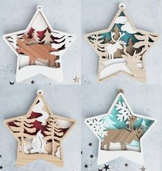 four wooden christmas ornaments in the shape of stars and deers with snowflakes on them