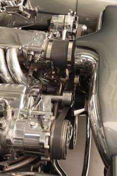 the engine compartment of a car is shown in close up view with no image on it