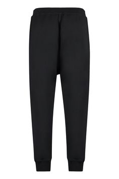 Unwind in style with these premium cotton track-pants that offer a relaxed fit and ribbed elastic ankle cuffs. Made with a blend of 1% elastane and 99% luxurious cotton, these track-pants are perfect for those who appreciate the finer things in life. Whether you're lounging at home or running errands in the city, these track-pants combine comfort with a touch of designer luxury. Relaxed fit Ribbed elastic ankle cuffs Material: 1% elastane, 99% cotton Ankle Cuffs, Running Errands, Track Pants, Dean, Black Pants, Jogging, The City, Outlet, Everyday Wear