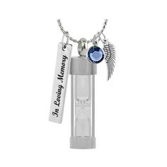 "Hourglass Necklace Ash Urn - Love Charms™ Option is made of stainless steel and glass, so perfect and beautiful, a beautiful way to remember a special loved one. FREE Birthstone FREE 18\" Stainless Chain FREE Gift Box FREE Fill Kit FREE Shipping on second or more items Your order will include a free 18 Stainless Steel Chain and Birthstone. Your pendant arrives in a Gift Box of black & mint, imprinted \"In Loving Memory\" gift box. Your fill kit includes a funnel, tube of adhesive, tooth pic Silver Glass Jewelry For Keepsake, Silver Glass Necklace For Keepsake, Silver Glass Necklace Keepsake, Silver Stainless Steel Jewelry For Memorial, Hourglass Necklace, In Loving Memory Gifts, Engraving Fonts, Keepsake Urns, Love Charms