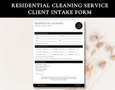 the residential cleaning service client intake form is next to some dried flowers on a table