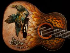 a painting of a guitar with a bird on it's back and neck, sitting against a black background