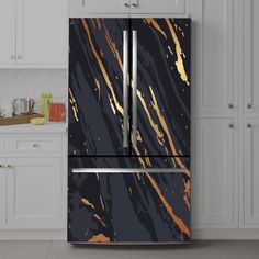 a black and gold marble refrigerator in a kitchen with white cupboards on either side