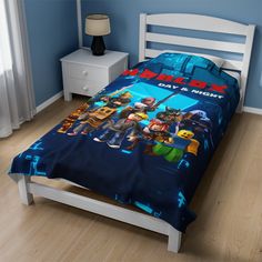 a bed room with a neatly made bed and toy story bedspread on it