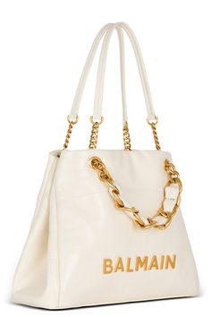 Balmain 1945 embossed bag in creme. 100% Calfskin 40x30x13.5cm Fits Iphone 15 Pro Max Made in Italy Luxury Cream Tote Bag, Luxury Cream Textured Leather Shoulder Bag, Luxury Cream Rectangular Bag, Luxury Cream Rectangular Shoulder Bag, Luxury Everyday Cream Bag, Luxury Cream Shoulder Bag, Luxury Cream Shopping Bag, Classic Shoulder Bag With Double Handle And Embossed Logo, Luxury Everyday Cream Shoulder Bag With Gold-tone Hardware