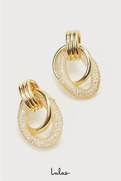 Sophisticated style will be your middle name, thanks to the Lulus Luxuriously Linked Gold Rhinestone Wire Door Knocker Earrings! Shiny, gold-toned metal shapes these elegant earrings that have a door knocker-inspired shape with two interlocking hoops, one with a solid round design and one with an oval-shaped, wire mesh design that holds a collection of glittering rhinestones. Post backs. 1. 25" long. Man made materials. Imported. Lulus | Luxuriously Linked Gold Rhinestone Wire Door Knocker Earri Gold-tone Plated Earrings For Party, Party Earrings In Gold-tone Plating, Gold-tone Plated Party Earrings, Party Gold-tone Drop Hoop Earrings, Elegant Gold Hoop Earrings For Party, Trendy Gold Earrings For Evening, Gold Metal Hoop Earrings For Evening, Glamorous Gold-tone Metal Earrings, Glamorous Gold Hoop Earrings For Evening