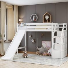 a white loft bed with a slide in the middle