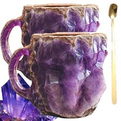 two mugs with purple crystals and a spoon