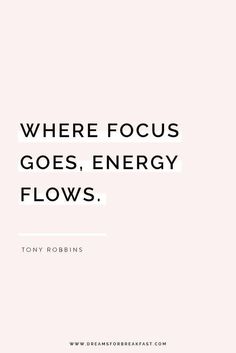 a quote that reads, where focus goes energy flows tony robins on pink background