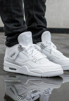 The Air Jordan 4, originally released in 1989 was the second Air Jordan designed by Tinker Hatfield. The sneaker sports mesh netting on the tongue and sides as well as plastic wing tabs and once again sporting visible Air in the heel. Jordan Store, Air Jordan Retro 4, Jordan 4 White, Anderson Paak, Good Fits, Dior Top, Jordan Retro 4, Retro Basketball Shoes