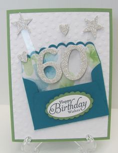 a close up of a birthday card with the number 60 on it's side