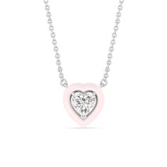 Embrace a subtle pop of color. This pendant necklace features a heart-shaped diamond expertly set on a frame in ceramic finish. Luxury White Necklace For Valentine's Day, Pink Diamond Heart Cut Necklace, Pink Heart-shaped Diamond Necklace, Pink Diamond Heart Charm Necklace, Pink Diamond Necklace With Heart Charm, Luxury Pink Heart Cut Necklace, Heart Pendant Necklace With Bezel Setting, White Heart Cut Jewelry With Single Diamond, White Heart Pendant Jewelry With Single Diamond