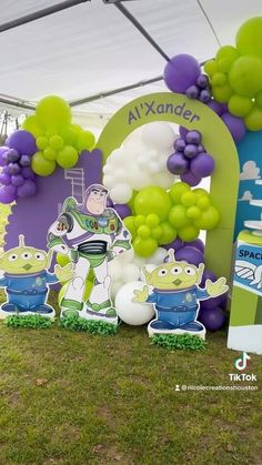 a toy story birthday party with balloons and decorations