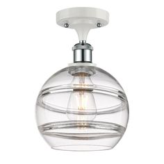 a clear glass globe light fixture