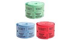 three rolls of tickets sitting next to each other