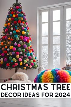 a colorful christmas tree decorated with pom poms