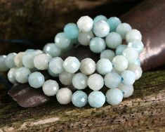 Capture the calming colors of a clear sky with these microfaceted amazonite rounds. Perfectly polished and precision faceted, they have undeniable sparkle and shine. Float them alongside silver charms for a serene, airy vibe in your design. Amazonite beads and focals look expensive, but won't break your bank account! These semi-opaque, blue-green stones vary from pale seafoam to darker aqua. Amazonite, also known as Amazon stone, is a classic case of mistaken identity. A greenish color stone was Turquoise Faceted Amazonite Jewelry, Faceted Turquoise Amazonite Jewelry, Amazonite Faceted Round Beads Jewelry, Aquamarine Faceted Beads Jewelry, Faceted Amazonite Round Beads Jewelry, Faceted Aquamarine Round Beads Jewelry, Faceted Aquamarine Beads Jewelry, Look Expensive, Green Stones