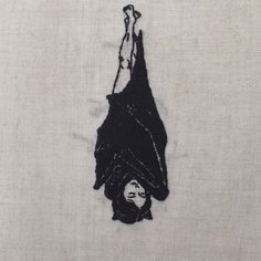 a drawing of a person hanging upside down