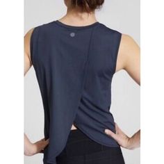 Looks Black In Some Photos But Is A Dark Navy Blue. Flaw-Some Loose Stitching Around The Right Armpit & What Looks Like A Deodorant Mark Near The Other Armpit Which Will Come Out W/Washing (See Photos Of Both) Otherwiselooks & Feels Brand New. Lightweight & Silky Soft. Love The Back Of This. Took Measurements Of Front & Back Lengths. Chest Measurements In Photos As Well. Added Stock Photos To Show Fit/Style & Description From Athleta Site. Discounted Shipping Included In The Price Of This Item Looks Black, Dark Navy Blue, Fit Style, Dark Navy, Mint Condition, Deodorant, Fitness Fashion, Stitching, Navy Blue