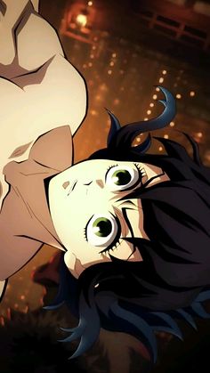 an animated image of a woman with black hair and big eyes looking at the camera