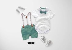 Dress your little boy in style and comfort with our Baby Boy Tie and Suspenders set! This adorable outfit is the perfect choice for your little ones, combining fashion and convenience for a charming look. The set features a short-sleeve shirt with a classic bowtie and matching suspenders shorts, creating a cool and fashionable ensemble. The turn-down collar design adds a touch of sophistication, making your baby boy look dapper and stylish. Crafted with care, the shirt comes with 3 snaps at the Green Suspenders, Tie And Suspenders, Aesthetic Galaxy, Boys Ties, Suspenders Set, Shorts Fashion, Looking Dapper, Collar Designs, Green Shorts