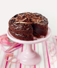 a chocolate cake with one slice cut out