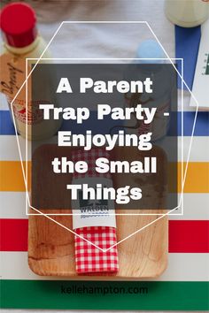 a wooden tray with food on it and the words, a parent trap party enjoying the small things