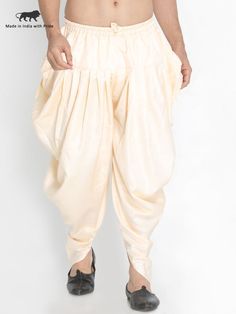 VM By VASTRAMAY Men's Beige Silk Blend Dhoti Traditional Drape Kurta With Tilla For Eid, Festive Kurta With Tilla And Traditional Drape, Festive Harem Kurta For Eid, Festive Eid Harem Kurta, Traditional Art Silk Sherwani For Puja, Bollywood Style Harem Kurta For Festive Occasions, Navratri Traditional Sherwani With Traditional Patterns, Traditional Sherwani With Patterns For Navratri, Traditional Drape Wear With Dabka For Puja