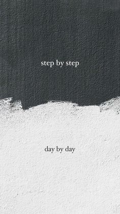 a black and white photo with the words, step by step day by day on it