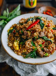 This Thai fried rice recipe, with Thai basil, scrambled egg, chilies, and fish sauce, can be made with pork, chicken, beef, or shrimp. Source: thewoksoflife.com Fancy Rice, Sugar Showpiece, Asian Sides, Health 2023, Grain Dishes, Basil Fried Rice, Koreansk Mat, Fried Rice Dishes, Thai Fried Rice