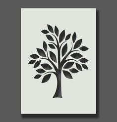 a black and white tree with leaves on it's branches is shown in the shape of a square